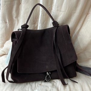 This BEAUTIFUL bag is looking for a home!